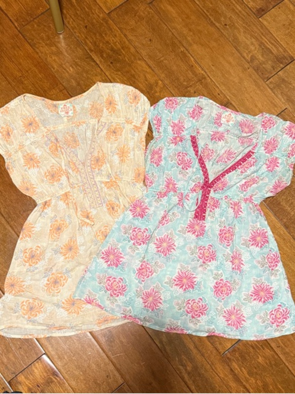 2 Free People Light Blue & Orange Tunics with Floral Print
